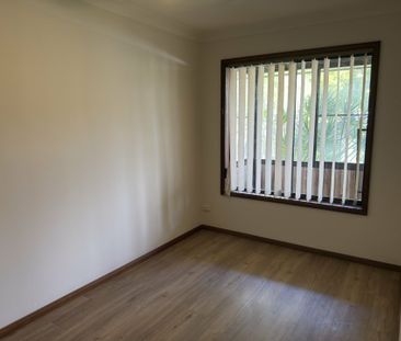 Coastal Comfort in a Quiet Duplex Setting - Photo 3