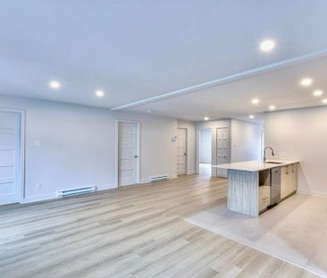 CONDO 5 1\2 FLAMBANT NEUF + 5 ÉLECTRO INCLUS + GRAND BALCON + STATI... - Photo 3