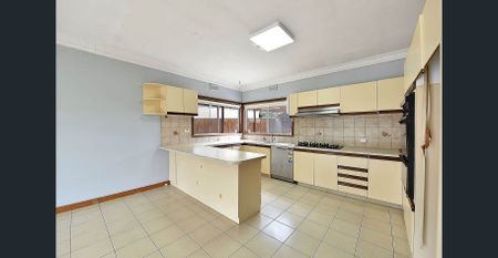 Charming Family Home in Prime Airport West Location - Photo 2