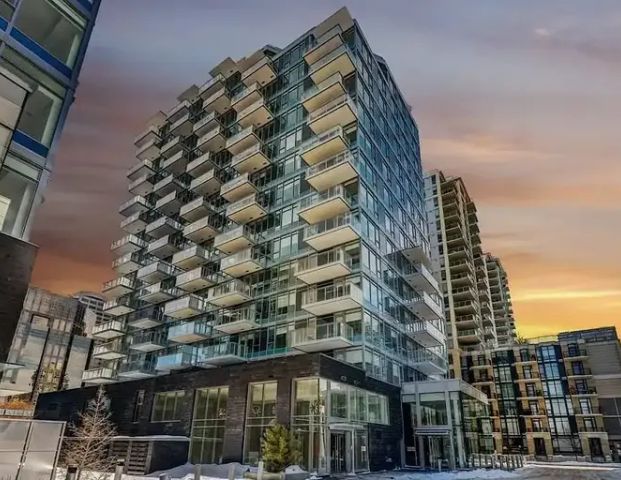 Like New Fully Upgraded 1 Bed 1 Bath in Parkside with River Views | 1005 - 108 Waterfront Court Southwest, Calgary - Photo 1