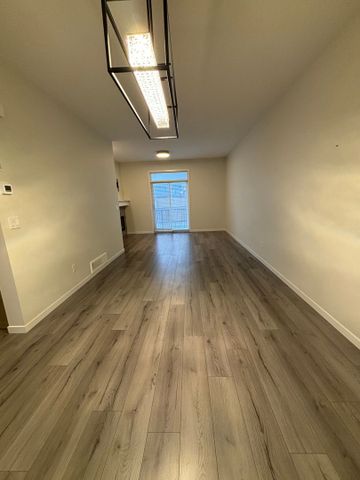 Charming 2-Bedroom Home in Airdrie – Convenient &amp; Cozy! - Photo 2