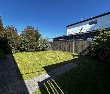 Two Bedroom Unit with Private Garden and Garage - Photo 6