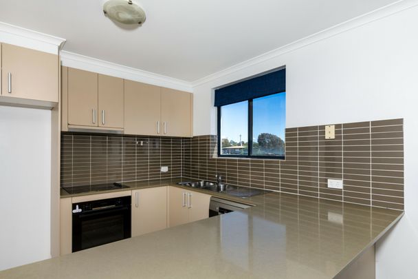 Convenient Living with Space and Comfort - Photo 1