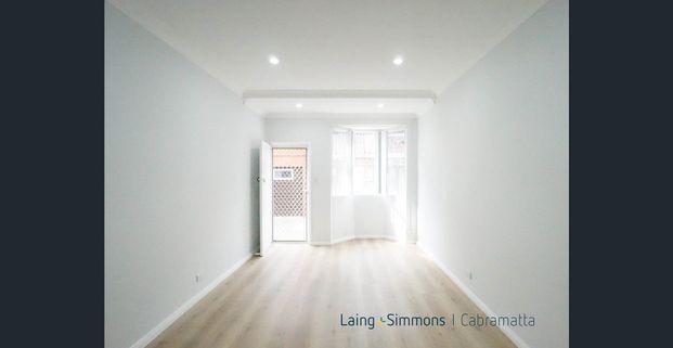 FULLY RENOVATED TOWNHOUSE - Photo 1