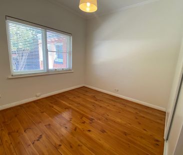 Sunlit, spacious, detached homette-style unit with private rear cou... - Photo 6