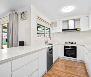 Step inside this beautifully renovated home - Photo 2