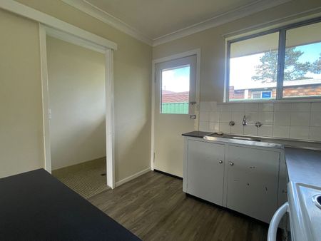 Brick 2-Bedroom Unit in Convenient Location - Photo 5