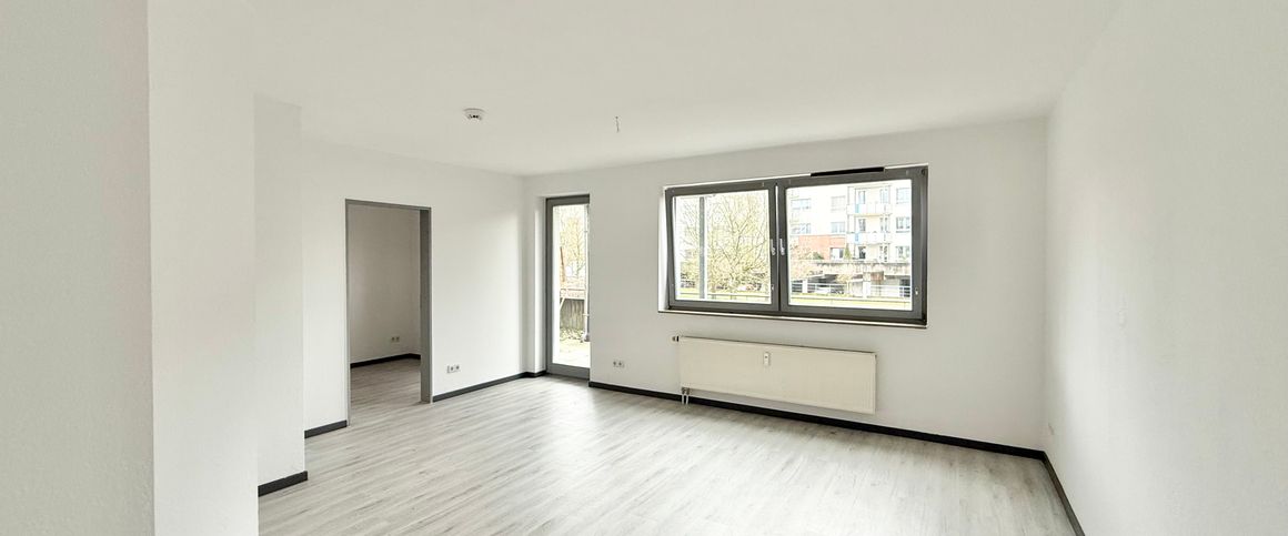 Helle 2-Zimmer-Erdgeschosswohnung mit Terrasse in zentrumsnaher Lage - Foto 1