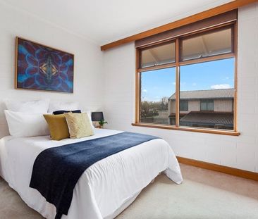 Open the Door to Easy Two-Level Living Close to the CBD - Photo 2