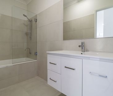 MODERN, STYLISH, AND READY TO ENJOY - WELCOME HOME TO 27 QUEST LANE! - Photo 6