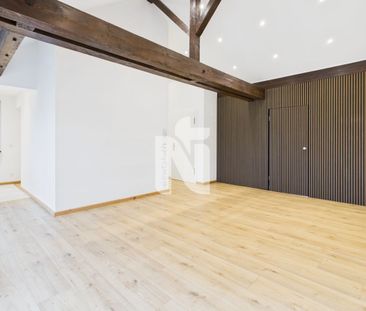 Charming 4.5-Zimmer-Attikawohnung with large balcony and direct lif... - Foto 1