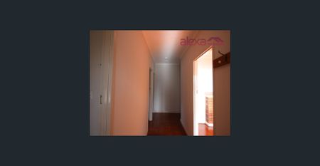 Convenient and Low-Maintenance Living: A Charming 3-Bedroom Brick Home - Photo 3