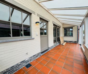 Halfopen bebouwing met garage - Photo 2