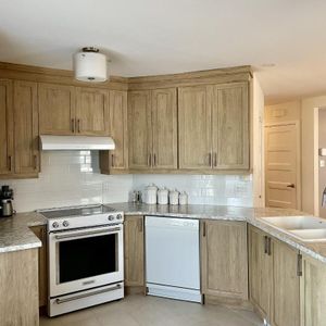 Grand 5 ½ rénové – Style condo – Fabreville – 1er étage Triplex – 1950 $/mois - Photo 2