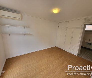 Stylish & Low-Maintenance Apartment Living in a Convenient Location - Photo 1