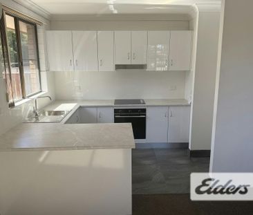 PRIVATE COURTYARD + EASY CARE LIVING - Photo 4