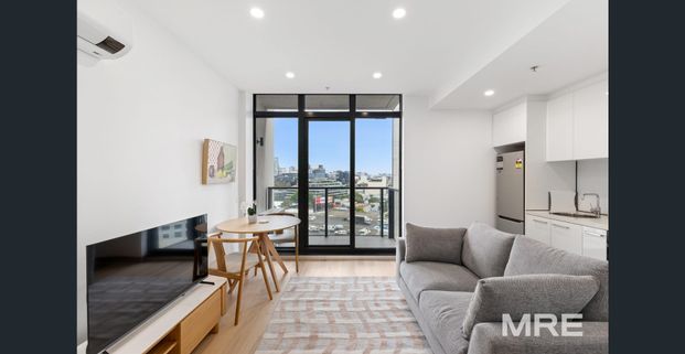 Located in the heart of it all - Photo 1