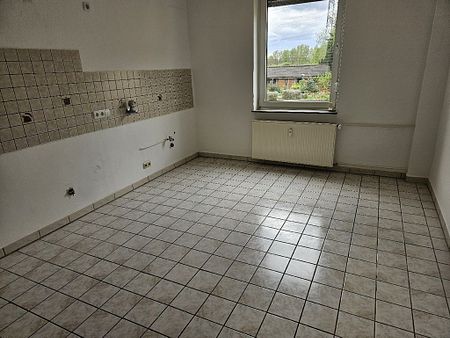 Modernisierte Erdgeschosswohnung mit ca. 65 m² Wohnfläche, 2 Zimmern und Wohnküche - Photo 4