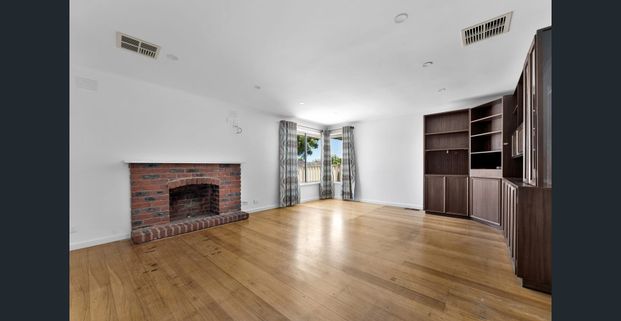 Warm & Inviting in Prime Location! - Photo 1