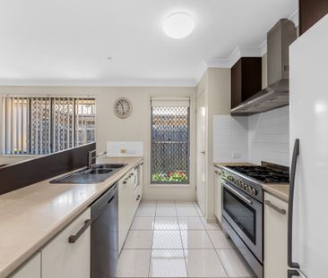 Comfortable and Convenient 4-Bedroom Family Home - Photo 4