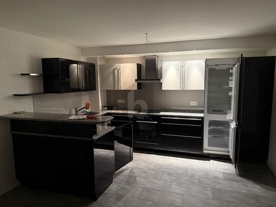 LIGHT, MODERN WITH BALCONY AND TOP KITCHEN - Photo 1