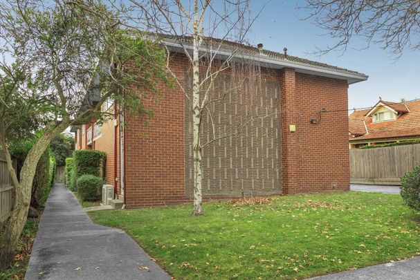 TWO BEDROOM BEAUTY IN SOUGHT AFTER LOCATION - Photo 1