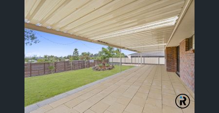 Spacious 4-Bedroom Home in Prime Carrara Location - Photo 5