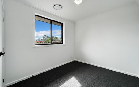 Brand New 4-Bedroom Duplex in Prime Location! - Photo 4