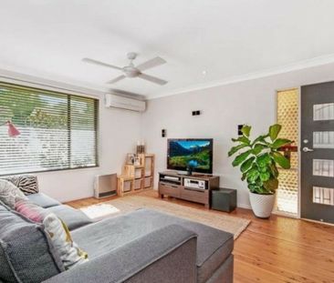 Neat Three-Bedroom Home in Convenient Location - Photo 1