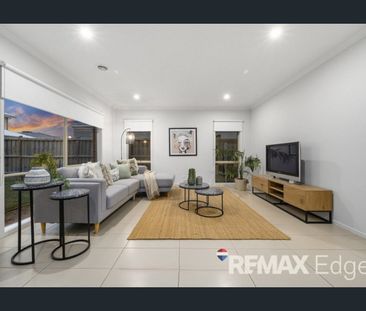 Exquisite Double-Storey Home with Modern Elegance - Photo 1