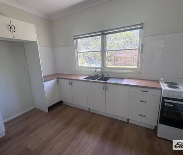 Rural home in the heart of town - Photo 3