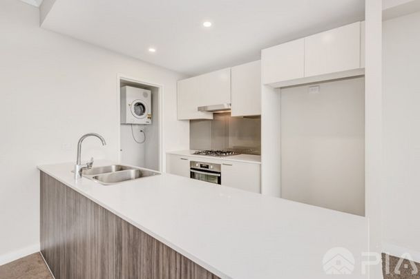 Modern 2-Bedroom Apartment in the Heart of Homebush - Photo 1