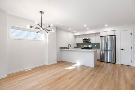 Edmonton Unfurnished townhouse Rental in Parkdale - BRAND NEW Modern Main-floor with Quartz Kitchen & Direct Transit Access - Photo 4