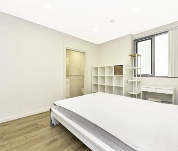 Top-Floor Penthouse with Dual Balconies | District Views - Photo 1