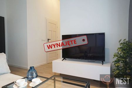 Apartament w prestiżowej kamienicy - Zdjęcie 2