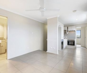 Modern unit with natural light and family friendly design - Photo 1