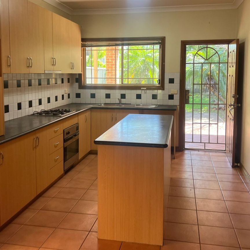 Modern Family Duplex in Prime Location - Photo 1