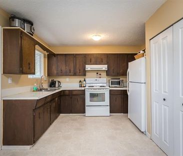 Upper Home with Large Fenced Yard - Photo 2
