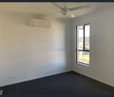 Modern 4-Bedroom Family Home – Lawn Maintenance Included - Photo 3