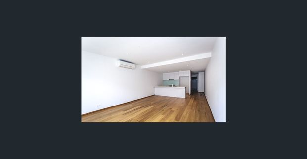 Spacious Two-Level Apartment Living - Photo 1