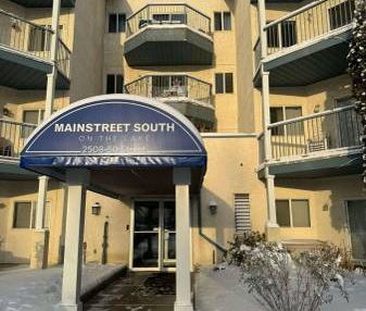 GREAT 1 BED, 1 BATH MAIN FLOOR CONDO W/AN OUTSIDE PARKING STALL IN MIL - Photo 3