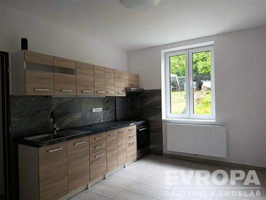 Pronájem bytu 1+1 v bytovém domě se zahradou, Liberec, ul. Zlínská - Photo 1