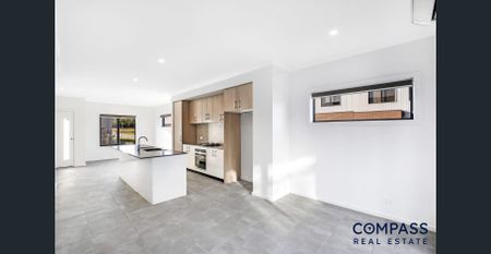 Brand New 3-Bedroom Townhouse Available Now - Photo 5