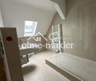 Wohnen auf zwei Ebenen: Sanierte 3-Zimmer Wohnung mit zusätzlichem ... - Photo 1