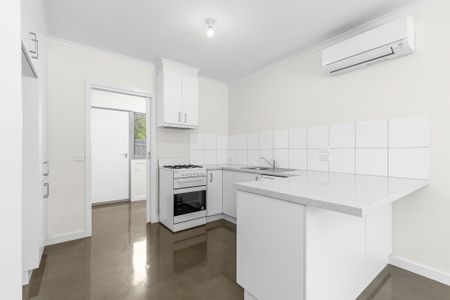 Modern Comfort & Convenience - Secure Two Bedroom Unit - Photo 2