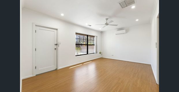 Spacious Family Living with Renovated Interiors and Extensive Outdoor Space - Photo 1