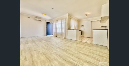 Convenient Two-Bedroom Apartment... - Photo 2