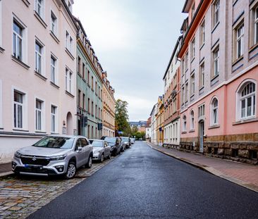 Sonnige Dachwohnung mit großer Terrasse und viel Altbaucharme, zent... - Foto 1