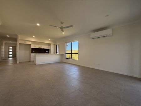 BEAUTIFUL 4 BEDROOM NEW BUILD IN BUSHLAND BEACH - Photo 4