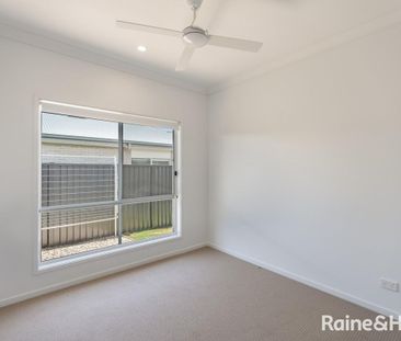 Modern Three-Bedroom Home in a Prime Location - Photo 4